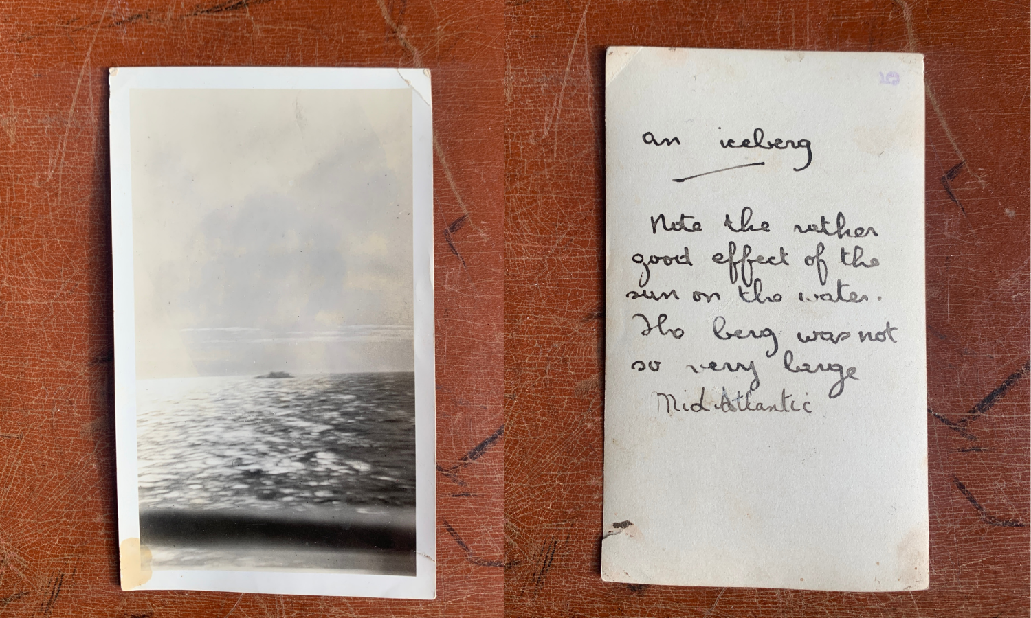   “An iceberg - Note the rather good effect of the sun on the water. The berg was not so very large. Mid Atlantic.”  